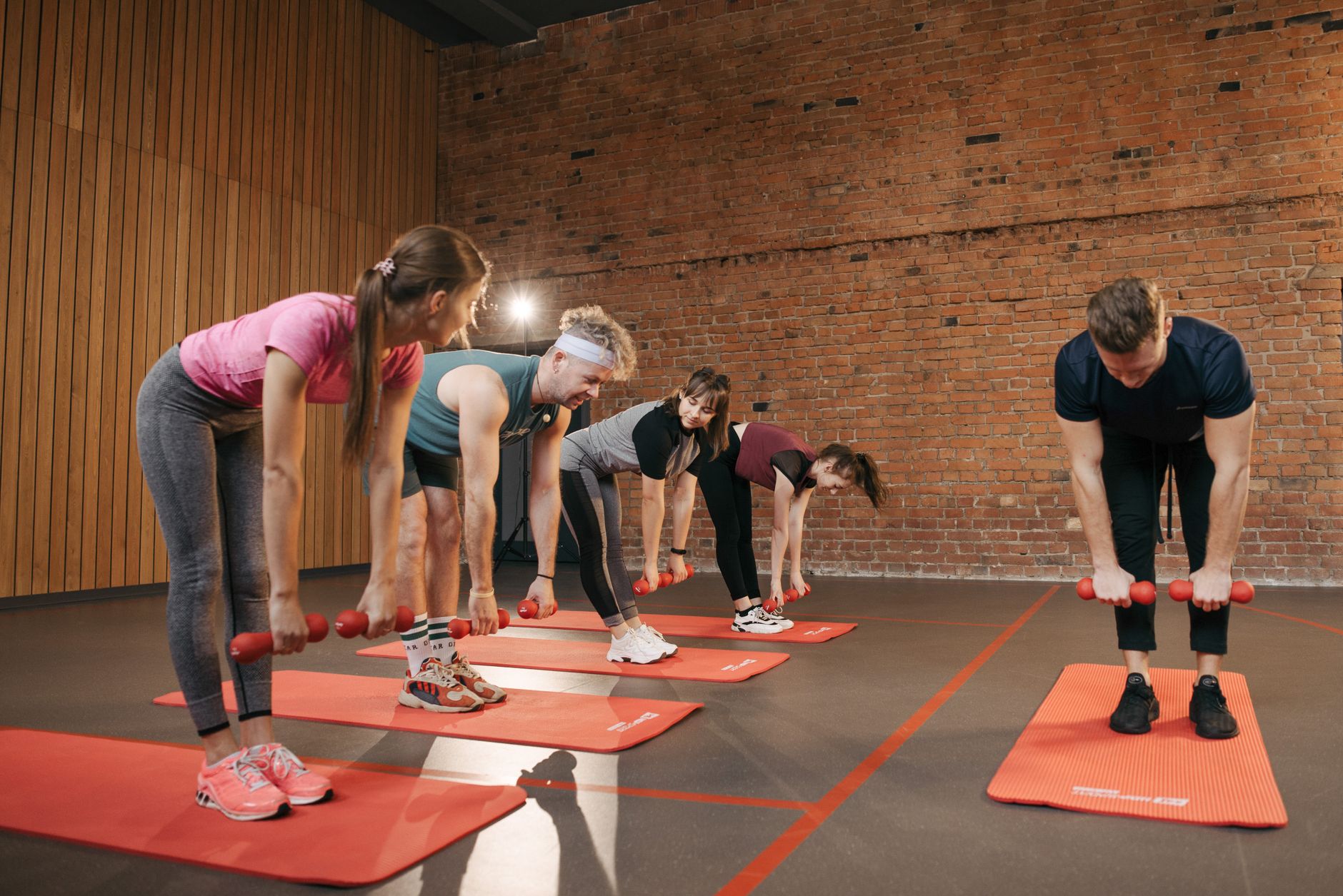 Small group hinging with dumbbells